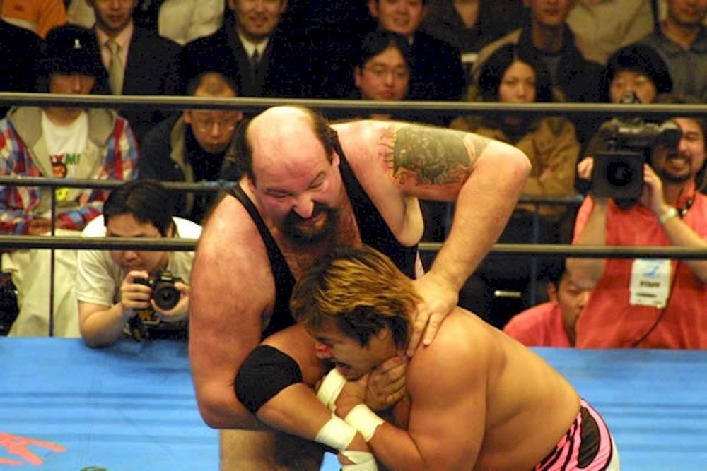 tentameter's tweet photo. TENTAMETER ENGAGED.

CALCULATING.

OUTPUT.

When John Tenta faced Satoshi Kojima for the MLW Title in AJPW...

{ERROR - CHECK DATABASE.
Computing - this actually happened}

...he was the same age as...

CALCULATING.

...Damian Priest.

TENTAMETER READING COMPLETE. https://t.co/8FCIBkrwfu