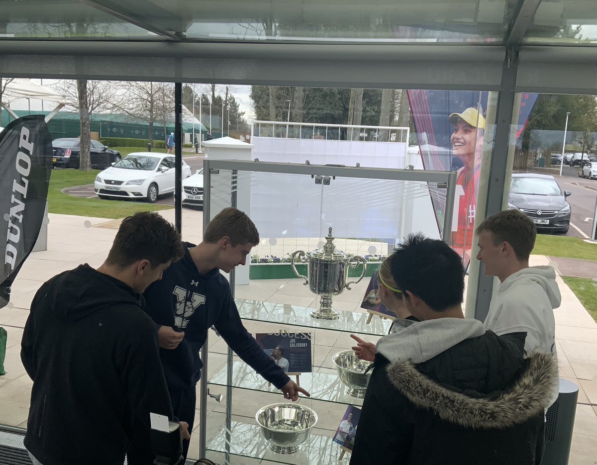 LTACompetitions's tweet photo. Players in the #LTANationalChampionships (including defending champion William Jansen) being inspired by the silverware bought home from the USA OPEN by Emma Raducanu and Joe Salisbury @LTACompetitions @joesalisbury92 @EmmaRaducanu https://t.co/AFkV54D2H0