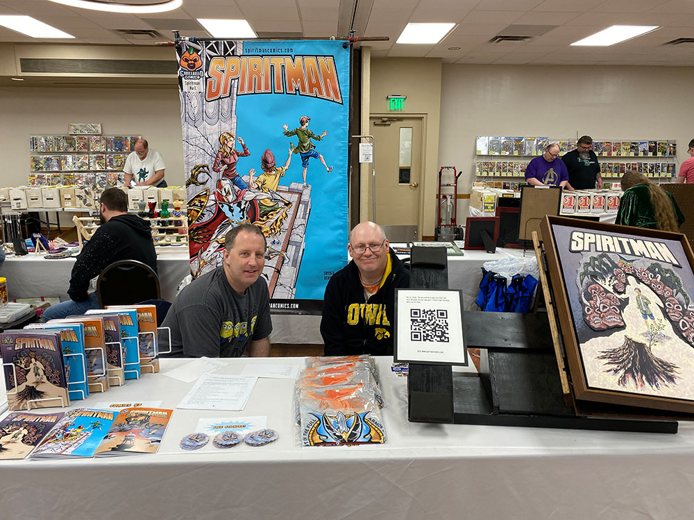 Had a great time at the miniCon in Des Moines. Thanks to the Iowa Comic Book Club for organizing the event. Thank you also to all of the people who stopped to chat with us and were daring enough to explore the big book.
 spiritmancomics.com
