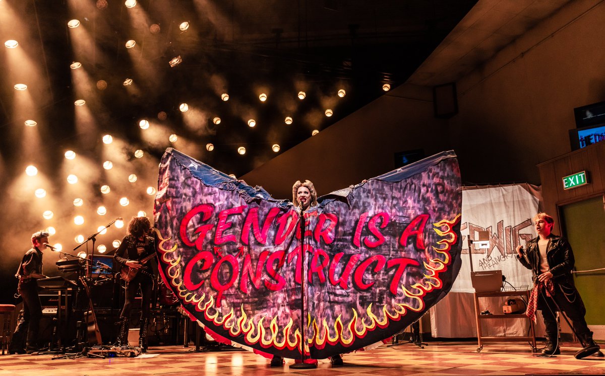 LeedsPlayhouse's tweet photo. 🤘The moment you have all been waiting for - @Divinadecampo &amp; @Elijah_Fer in #HedwigAndTheAngryInch. 

We are blown away with these stunning images, taken by the @_otherrichard 📸

Directed by @jamie_fletcher with Set &amp; Costume by @benjstones

🎟️https://t.co/PJSxH8lxha https://t.co/RH2cxMWERJ