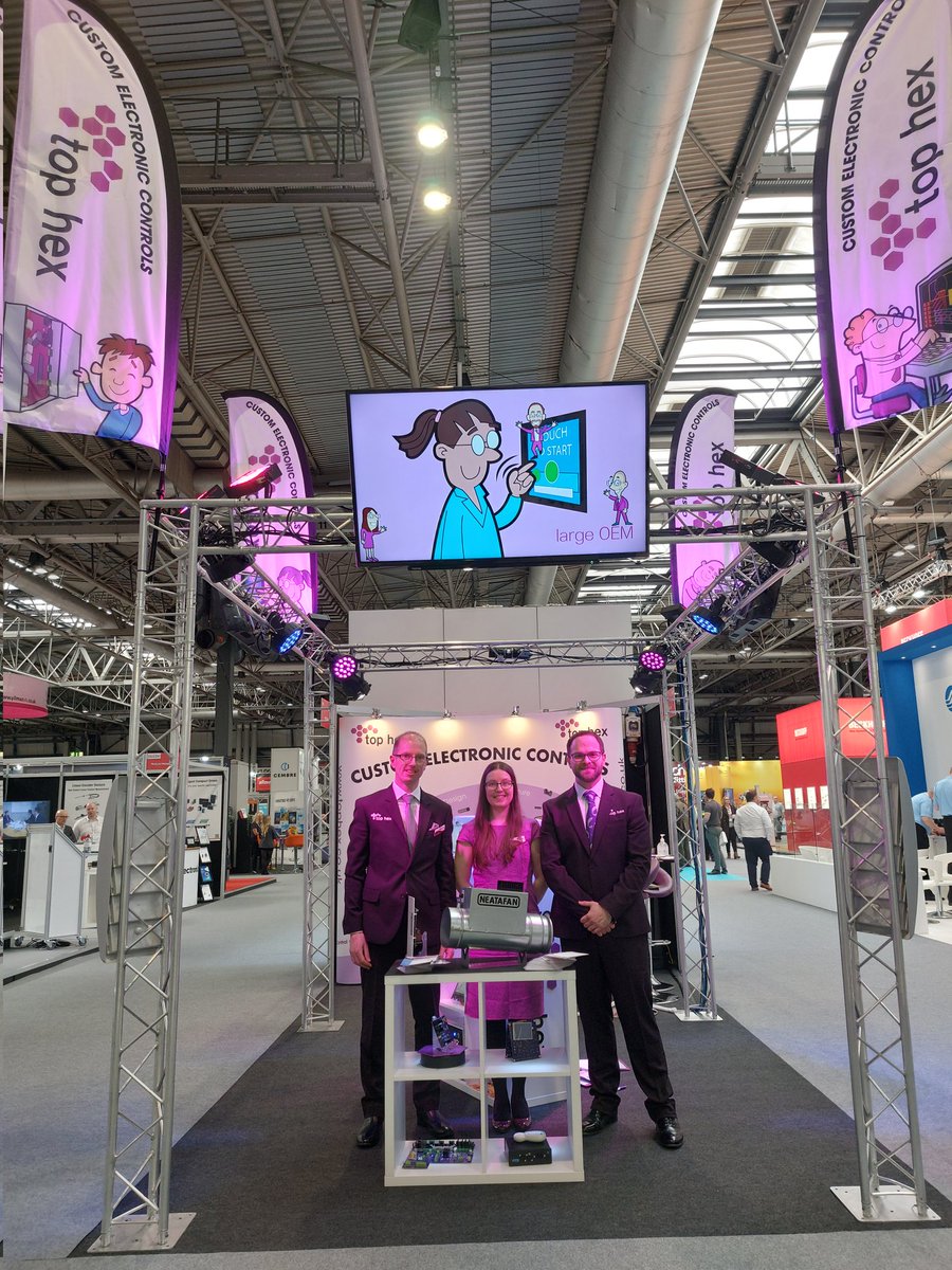 HexLtd's tweet image. The NEC is bathed in pink and blue light courtesy of Top Hex. Visit us for custom electronic controls on Stand F82- we're easy to find! #DrivesExpo #DrivesandControls #electroniccontrol