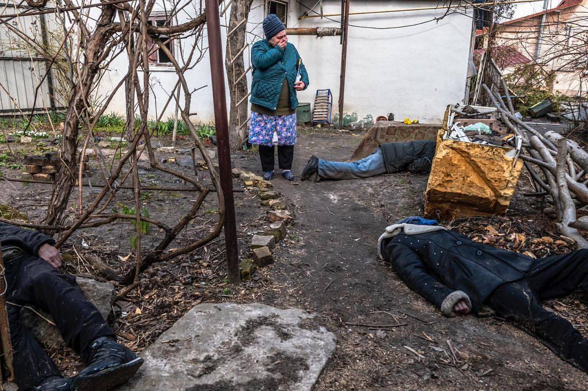 FedorovMykhailo's tweet photo. In the garden near the house, lying three men shot down - Sergii, his brother-in-law Roman, and one more unknown person. Sergii stayed in Bucha to take care of the dogs, which found dead near the owner's body.
This particular scene saw Roman's wife when she returned home to Bucha https://t.co/pPCzWuNRW0