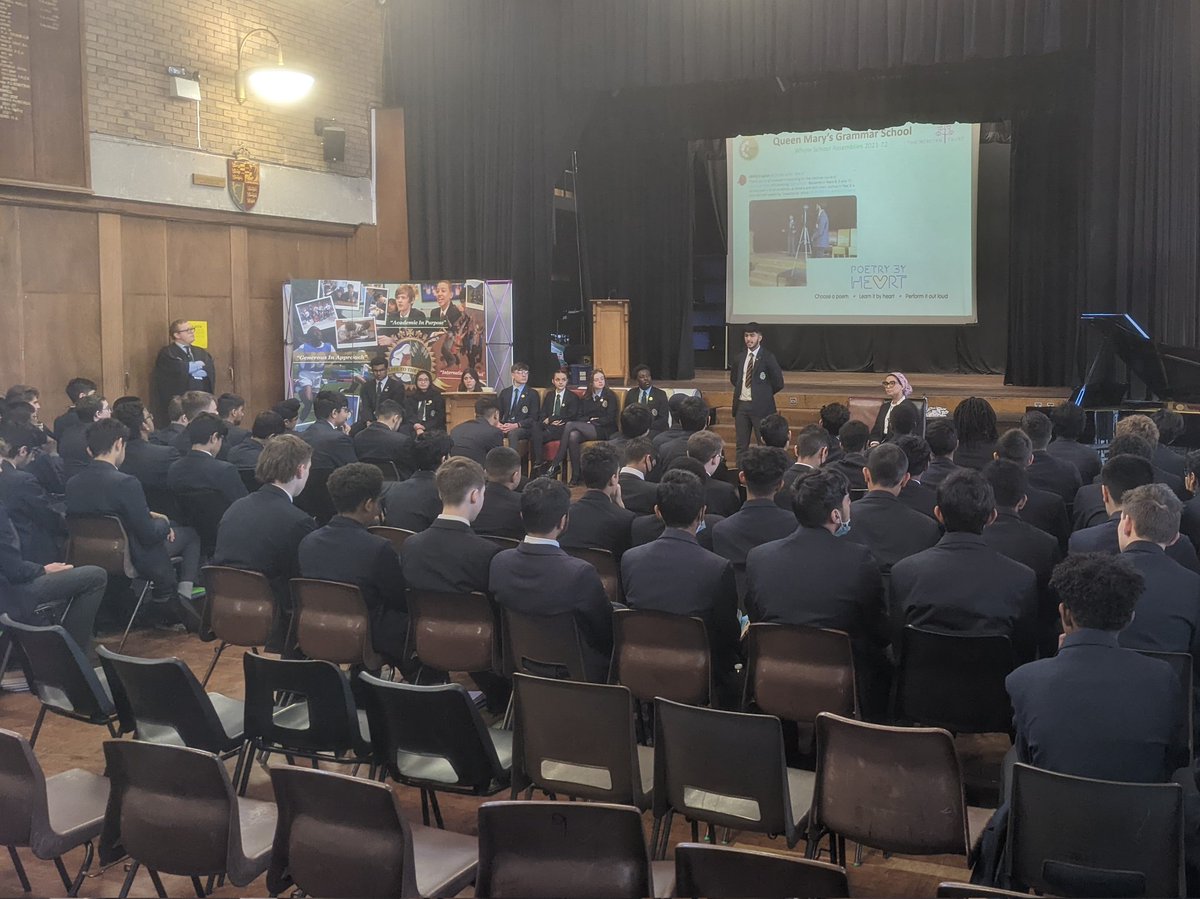 QMGSEnglish's tweet photo. Poetry recitation in assembly marked the end of the spring term for key stage 4 @qmgs1554. Nirav recited 'Invictus' by W.E. Henley and Isher 'We Wear the Mask' by P.L. Dunbar, their entries in the @poetrybyheart national competition. Sunt lacrimae rerum. #AcademicInPurpose https://t.co/xoS7voabdF