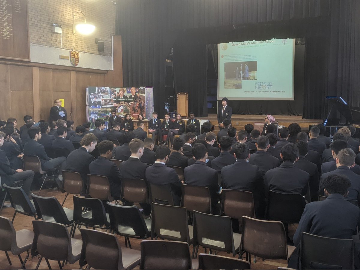 QMGSEnglish's tweet photo. Poetry recitation in assembly marked the end of the spring term for key stage 4 @qmgs1554. Nirav recited 'Invictus' by W.E. Henley and Isher 'We Wear the Mask' by P.L. Dunbar, their entries in the @poetrybyheart national competition. Sunt lacrimae rerum. #AcademicInPurpose https://t.co/xoS7voabdF
