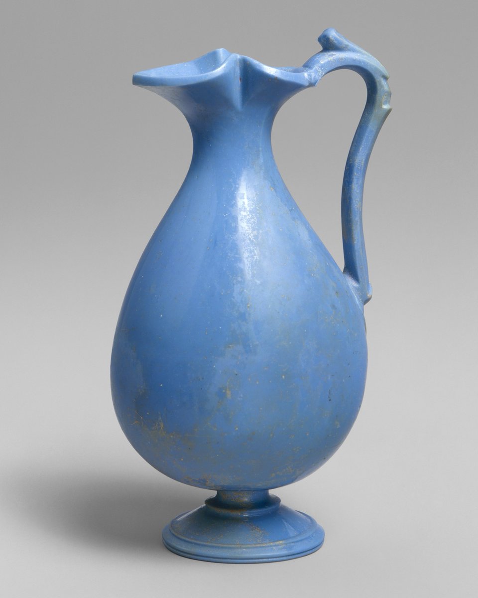 This opaque blue glass jug might look like it was made in the 19th century but it actually dates to the 1st century AD! A masterpiece of Roman glasswork, the jug was crafted in both hot and cold worked glass with detail carved afterwards and the base cut on a lathe. The Met