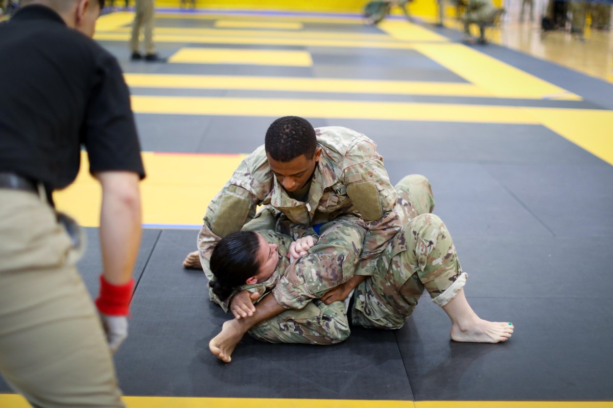 MCoEFortBenning's tweet photo. Let's get down to business.

The first rounds of the #LacerdaCup today tested competitors on their hand-to-hand combat basics on the mat. 

Intermediate rules kick off tomorrow - no pun intended.

#InfantryWeek @USArmy @TRADOC @usarec @usacac @PatDonahoeArmy @DerrickGarner20 https://t.co/0thSDBD34r