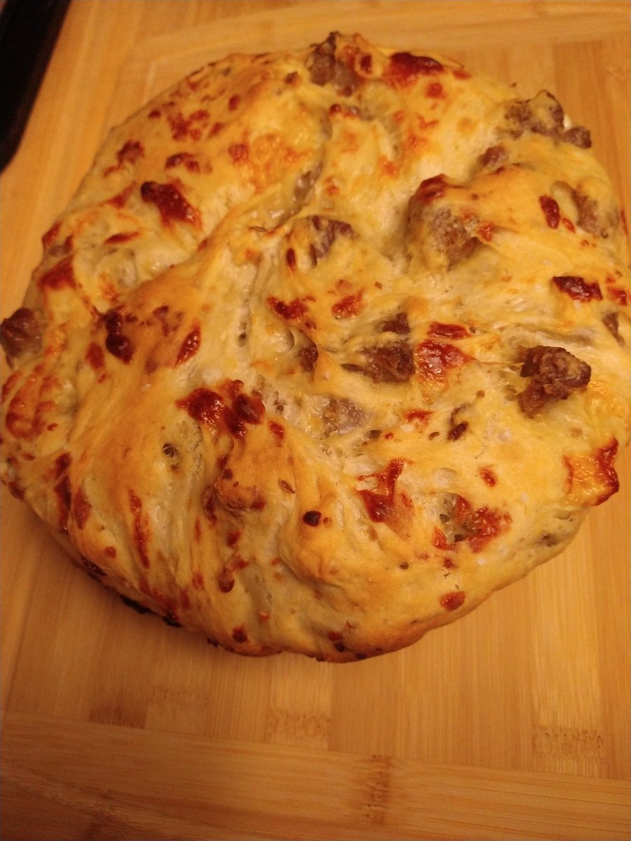 joclarke232's tweet photo. Look Poppy, I made it. It smells delicious. Recipe can be found on  @YouTube Poppy's Cucina. @queenluluthepug I'll send you a piece. 😏 #sausagebread https://t.co/zAkGBJtpAn