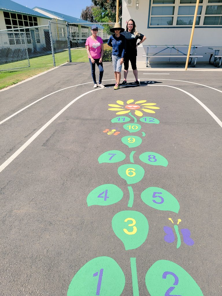 WalthallLisa's tweet photo. Spring Break shenanigans on the kindergarten playground! Principal Mirta Alcantar and Martha Hunter and Amber Chaparro painting the kindergarten playground! ♥️  #hesdpride baby! https://t.co/8AbRigQKf5