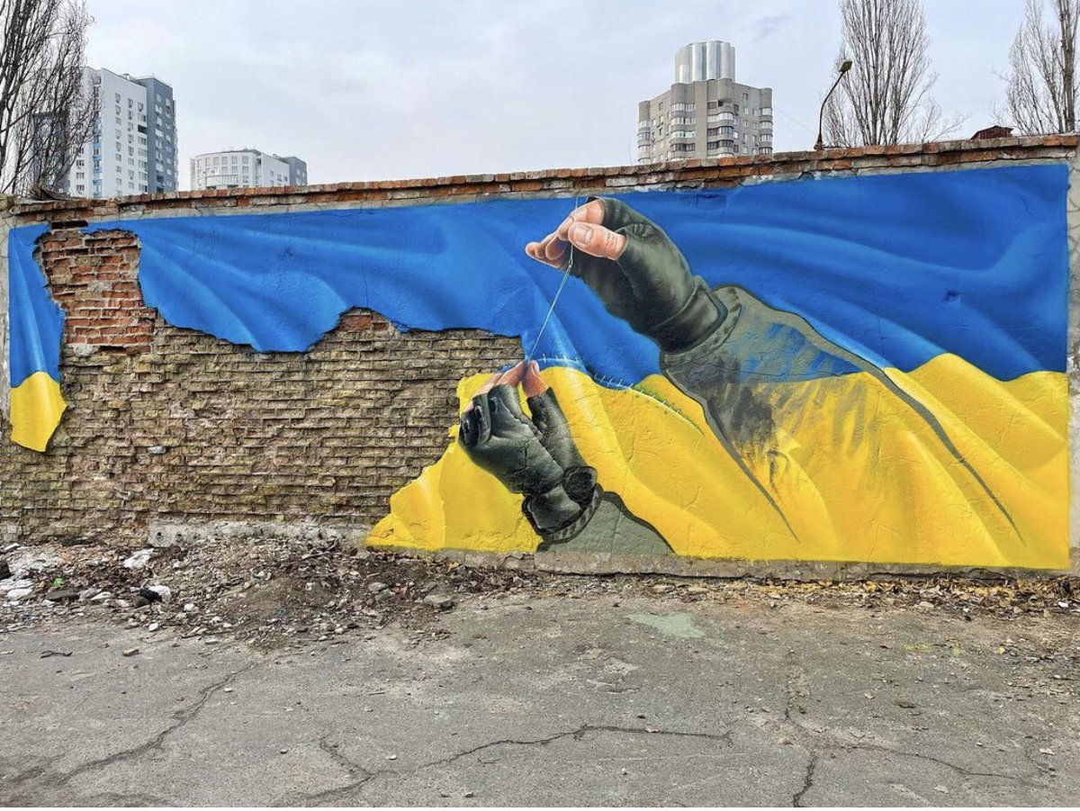 GicAriana's tweet photo. Inspiring street mural in Kyiv speaking to the incredible strength of national character of Ukraine. https://t.co/u3j2QIK2Nd