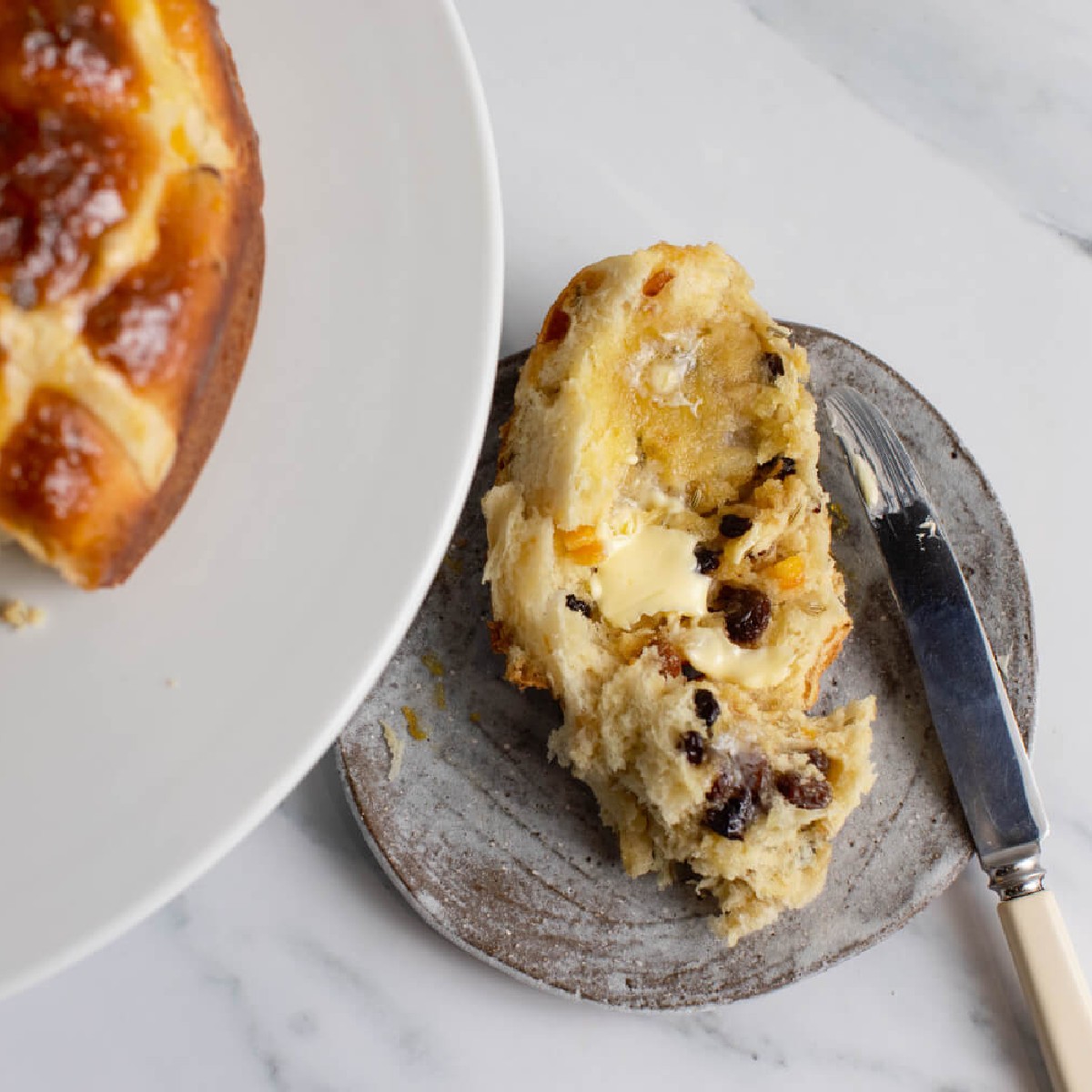 maplecanadauk's tweet photo. It’s #HotCrossBun season and we couldn’t be happier. But which to eat first? Our tear and share or vegan maple and cinnamon? https://t.co/Ytmh3tJDC9