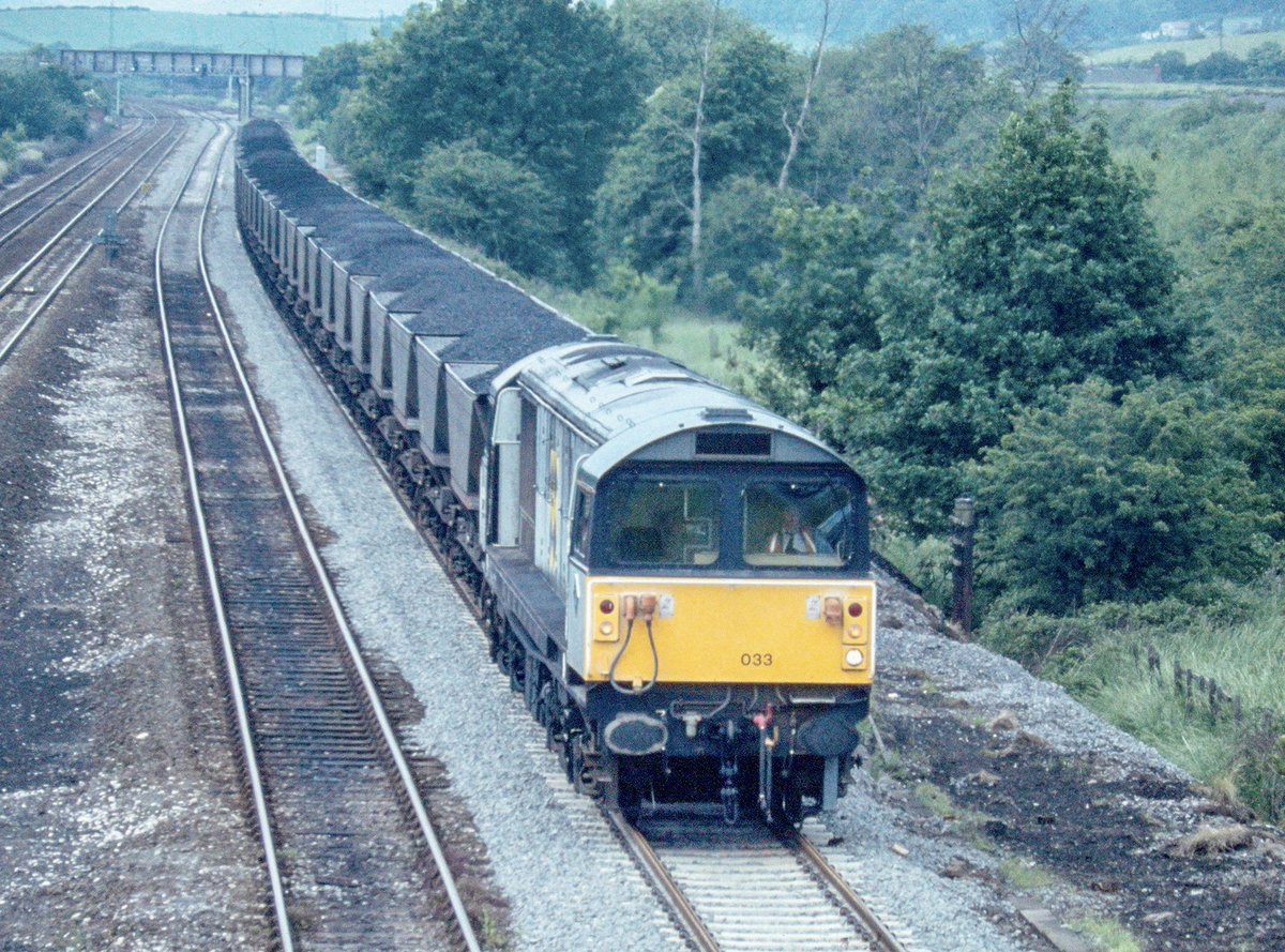 58033 Makes it presence known thundering towards Clay Cross with another fully loaded MGR train. #Class58 #RailfreightCoal #ClayCross #BritishRail #Trainspotting