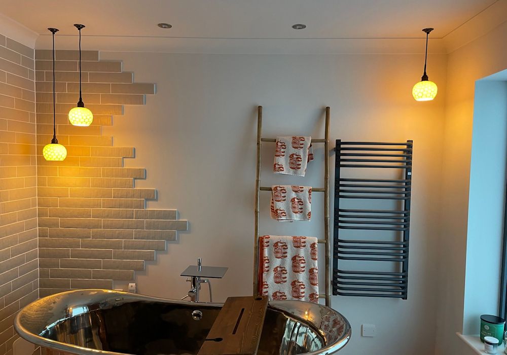 Pendant lighting makes a powerful statement and can transform interior spaces with the flick of a switch. bit.ly/3JHJSOm #bathroomlighting #interiordesign