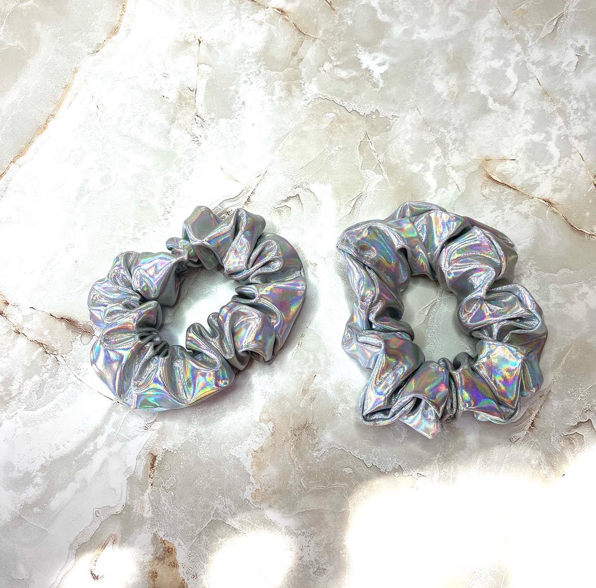 Holographic hair accessories are back in stock in my shop!! 

I have scrunchies, headbands, bandanas, and scrunchie scarves available✨