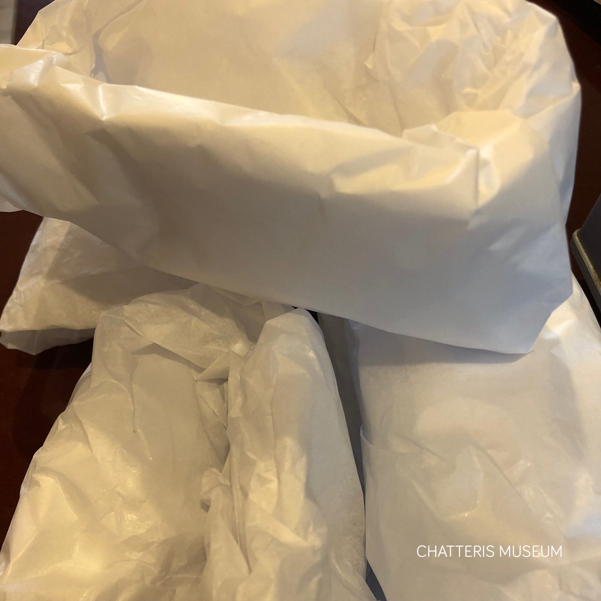 chatterismus's tweet photo. A production line of acid-free tissue paper puffs! Acid-free tissue paper is archival quality so is safe to use in direct contact with artefacts. The puffs provide cushioned support for smaller, more delicate objects within archival boxes.
#MuseumMove
#CollectionRelocation https://t.co/WLo741vgFP