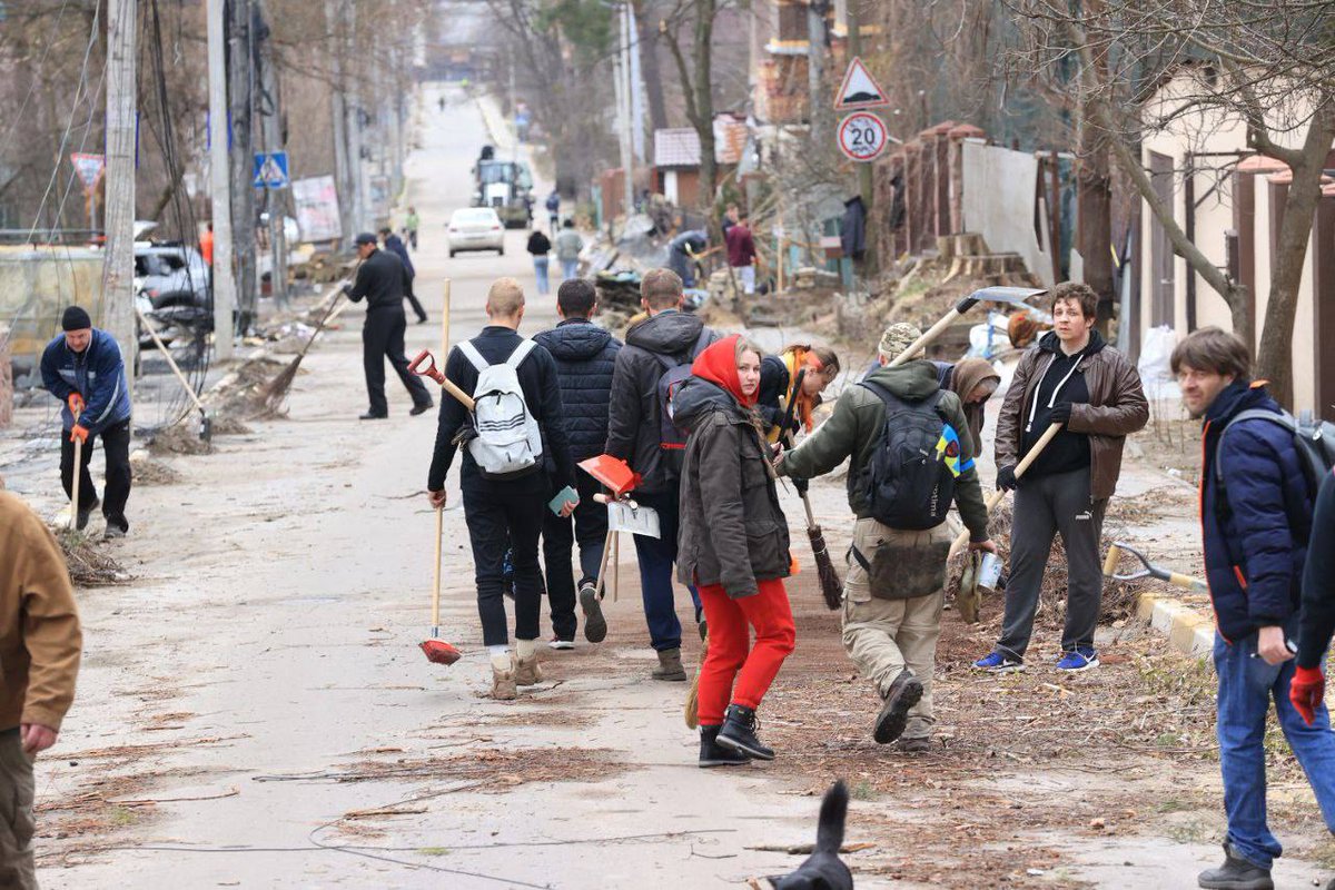 People cleaning up #Irpin after #Russians. 
This is how life wins over death. Hope over despair.
We love our home so much. We defend it. We live here.

#StandWithUkraine