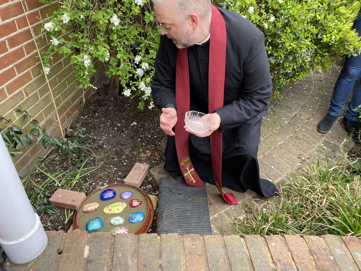 watfordblind's tweet photo. Fr David from St John’s Church joined us today as we laid stones in memory of some of our members in our garden. He led us in a short service and sprinkled each stone with Holy water as they were placed in the cement. #RememberingFriends https://t.co/G0gG5Ylf7s