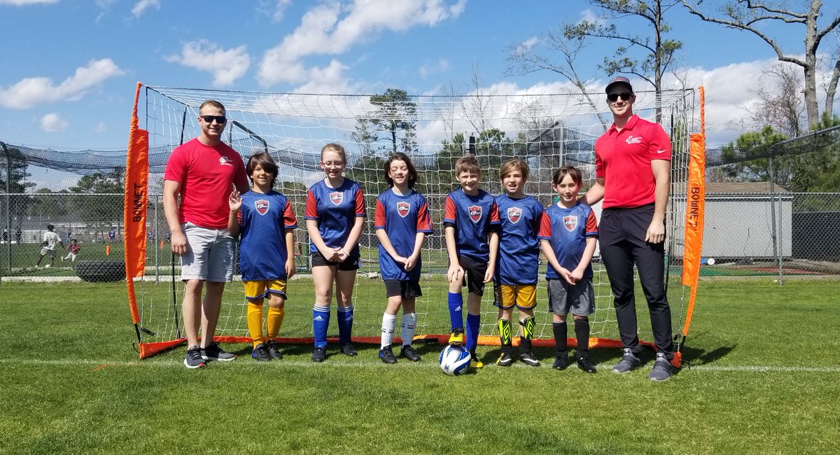 WilmHealth's tweet photo. Last week, Jonathan Heidkamp, PA-C, met with youth athletes on the Wilmington Health-sponsored team for i9 Sports to give them their new jerseys! #TRUEcare https://t.co/ZDi3GhJ8Za