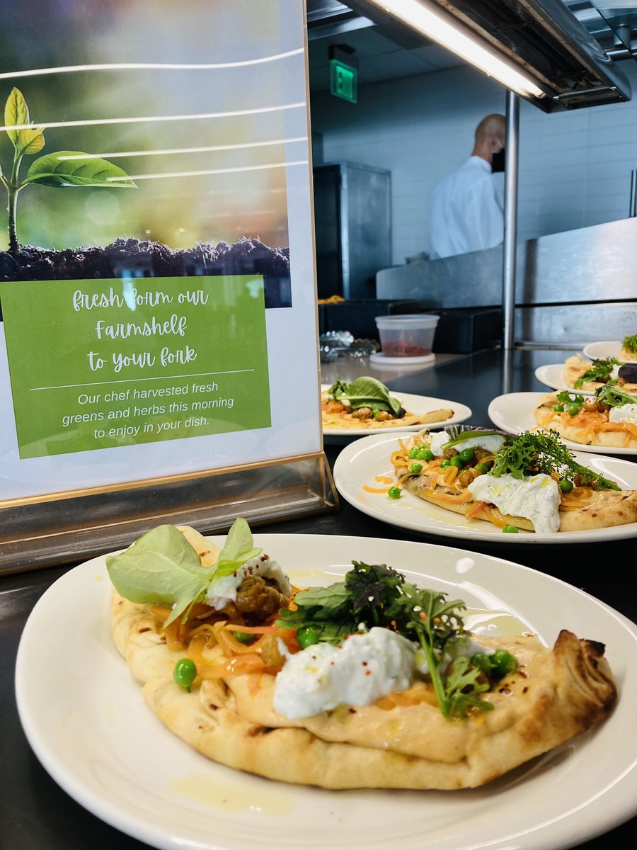 We love spring here!!!!!! Also greens were picked just one hour ago from our farmshelf for this flatbread with Halls Organic spring peas, hummus, yogurt and pickled onions #spitfire