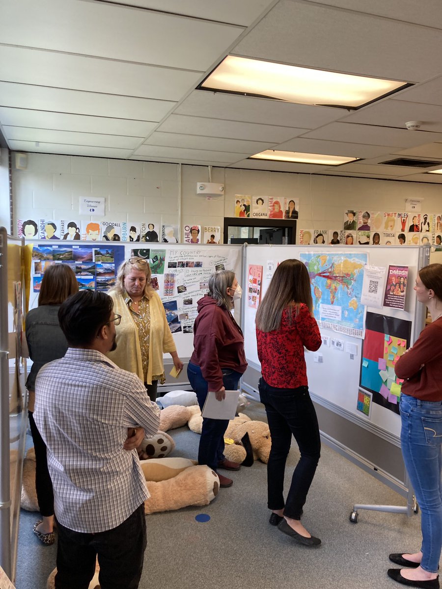 NE Crew looking for what students value in our Museum Walk Artifacts.