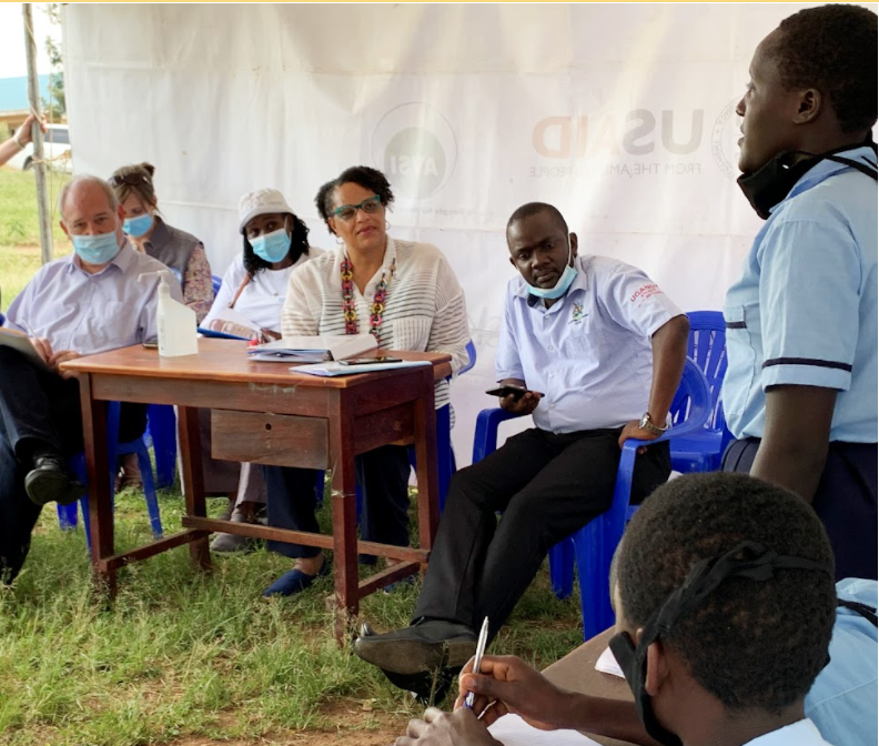 USAmbUganda's tweet photo. So pleased to see students, including young mothers, back in class at Kyempango Primary School. Kudos to all the teachers for the remote lessons during lockdown &amp; to 🇺🇸 partners @FCA_global &amp; @savechildrenug for the great work in nurturing inquisitive minds. https://t.co/FtGubqxK5B