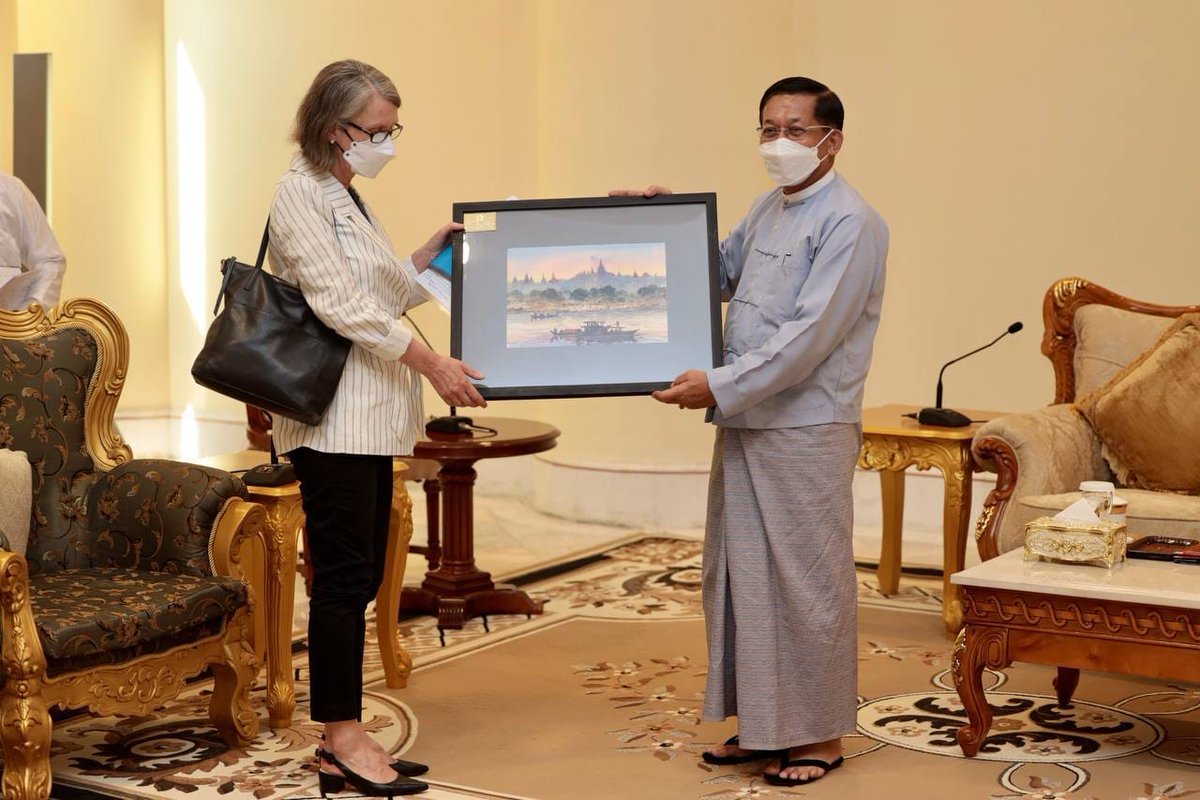 JusticeMyanmar's tweet photo. In act of treachery to the Myanmar ppl, Australia met Min Aung Hlaing, Ye Win Oo &amp; Wunna Mg Lwin. After "exchanging views on maintenance of good relations" &amp; hearing Min Aung Hlaing's outrageous justifications for his coup attempt &amp; reign of terror, the ambassador accepted a gift https://t.co/BqUOXWGlEm