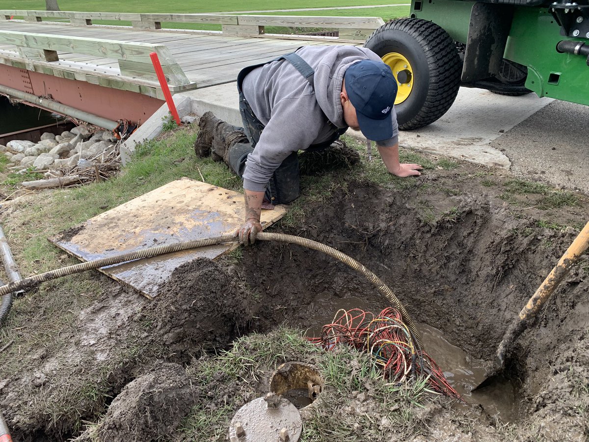 IlliniCC_Turf's tweet photo. Assistant Superintendent Jason Herbert in his element. #FirstLeak #IrrigationWhisperer https://t.co/cHlcytTaMo