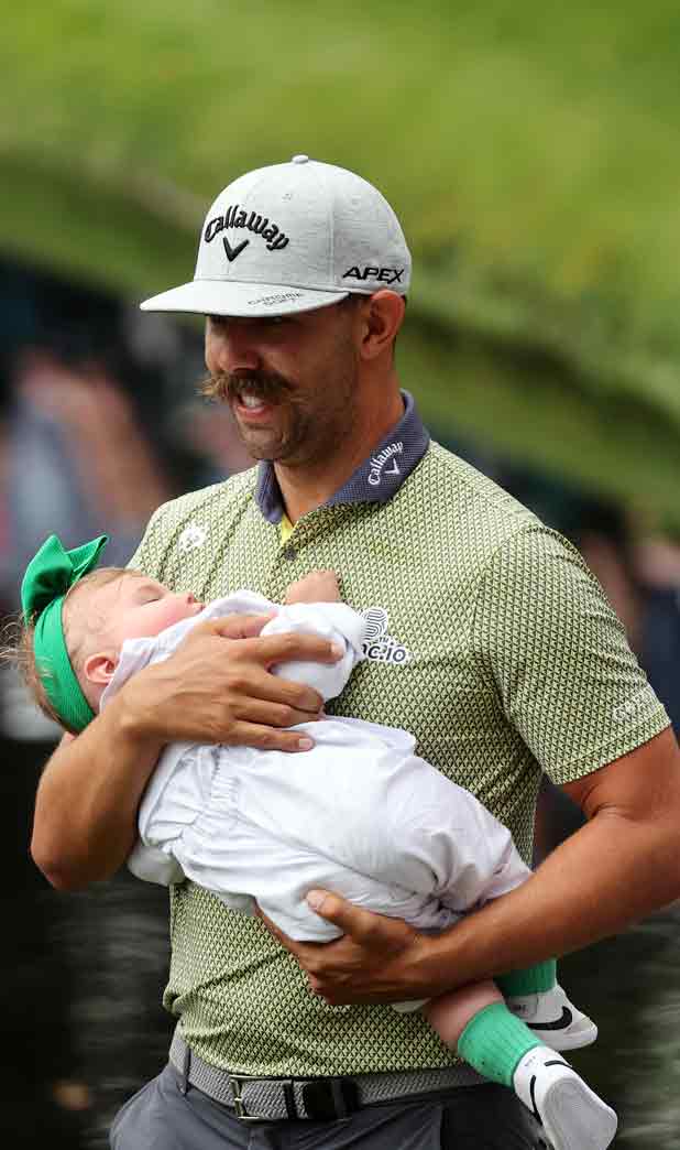 Absolutely swooning over the cuteness on display at the Par 3 Contest this year!! Love this one of <a href="/FredVR_/">Erik van Rooyen</a> and his baby girl, omg 😍
Photo by Gregory Shamus/Getty Images.