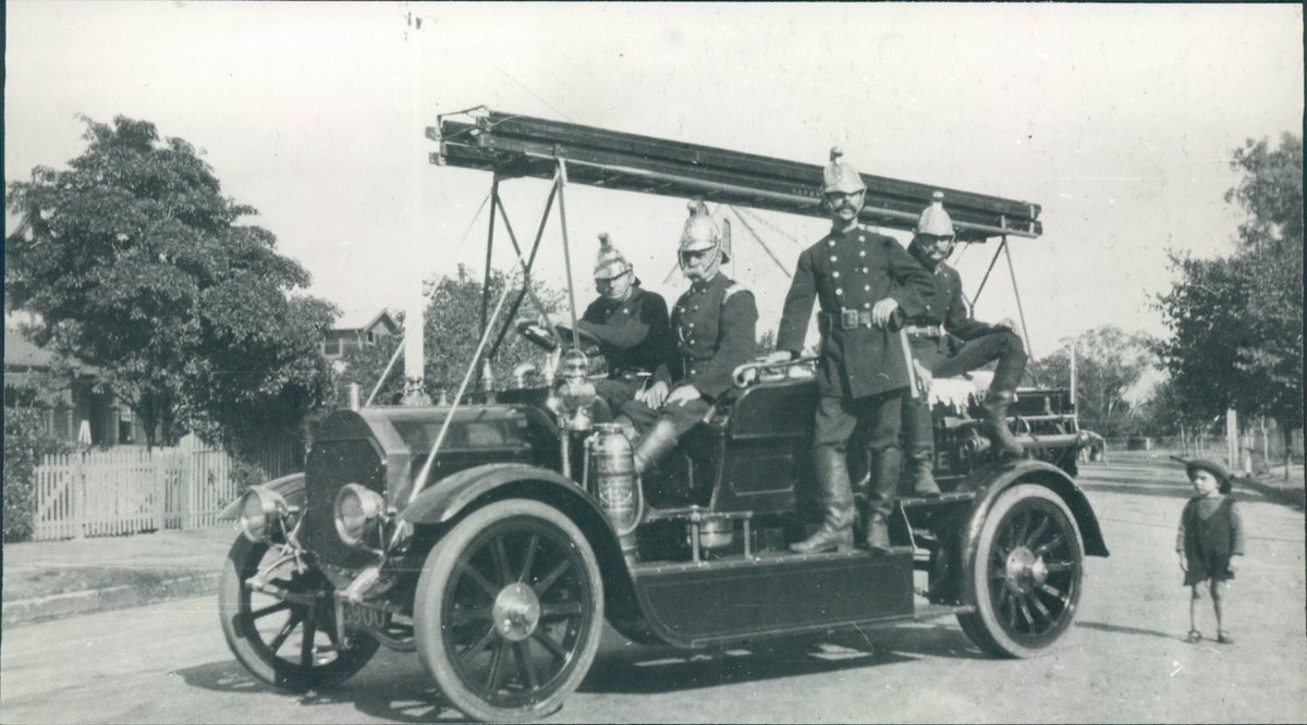 SA_MFS's tweet photo. Toddler Bill Abery, at an #Unley #SAFireBrigade facility at Unley in 1919, admiring the fire engine his father Albert (standing) & colleagues are atop.
Bill was born & grew up across the road from #Adelaide Station in the married quarters cottages.
#ThrowbackThursday #TBT https://t.co/ndO9Fi9RL3