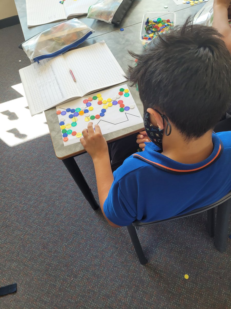 MissKeath's tweet photo. 3A using informal measurement tools to figure out which crooked path is the longest! "We know the third line is the longest because it is 18 counters long where the others are 12 and 14 counters long" - Zeina @AitkenCreekPS @_Mrs_Shah https://t.co/6EPInHhjui