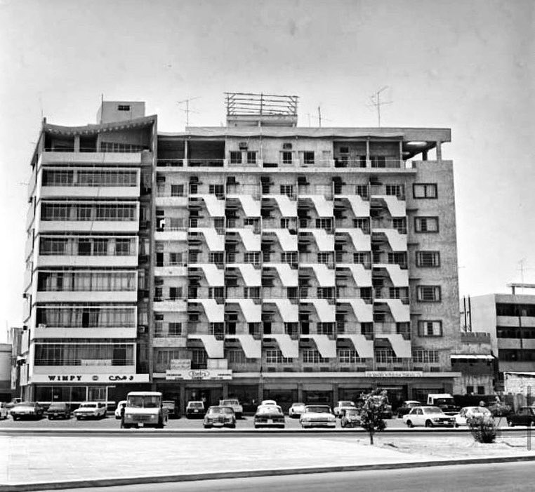 TheOldBahrain's tweet photo. June 1972 v April 2022🇧🇭: The famous “Wimpy Building”, nicknamed because of its ground floor cafe - and (the lower part of) Zamil Tower that now stands in its place.
#theoldbahrain #bahrain #البحرين #alzamil https://t.co/2mb1QdUkNg