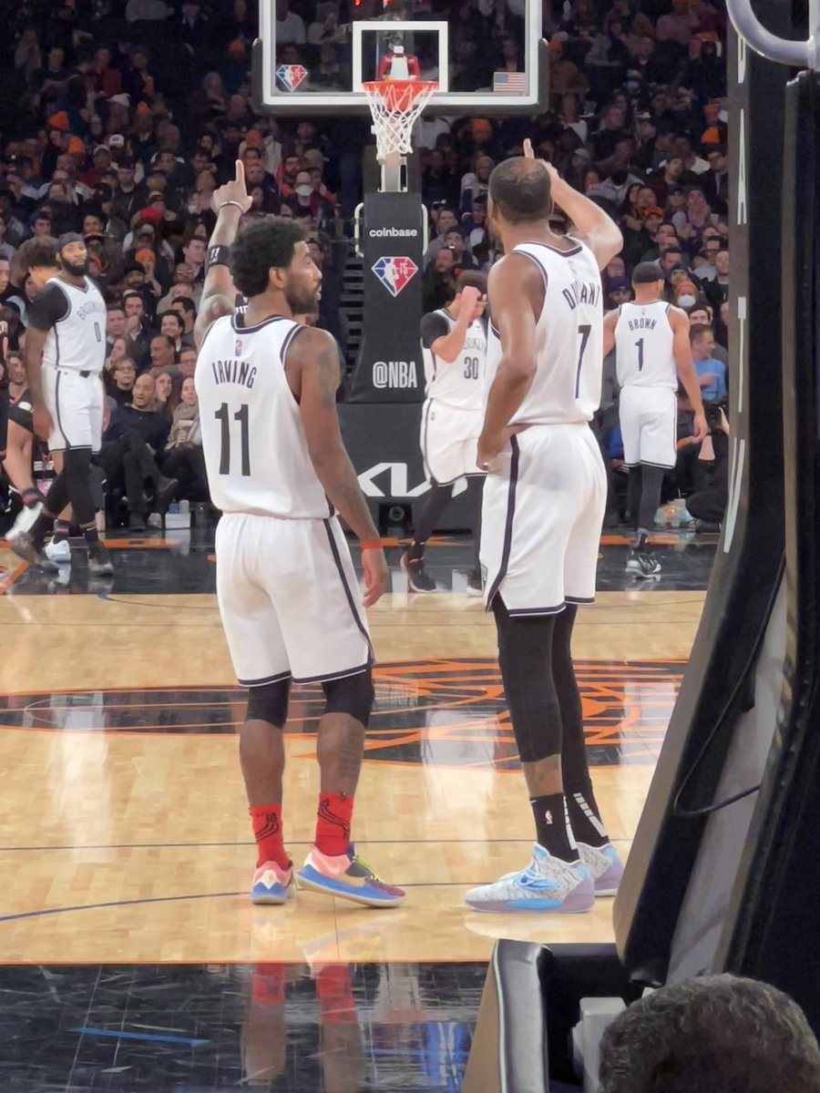 TheRealSTBrown's tweet photo. @KDTrey5 @KyrieIrving Took this pic of you guys last night. Think this was when you were down double digits before the awesome comeback. What were you pointing towards and talking about? I imagine “they’re gonna need to hang our jerseys in the msg rafters after this comeback” https://t.co/HdiBEQ9ngR
