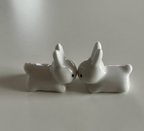 two ceramic bunnies (they kiss)