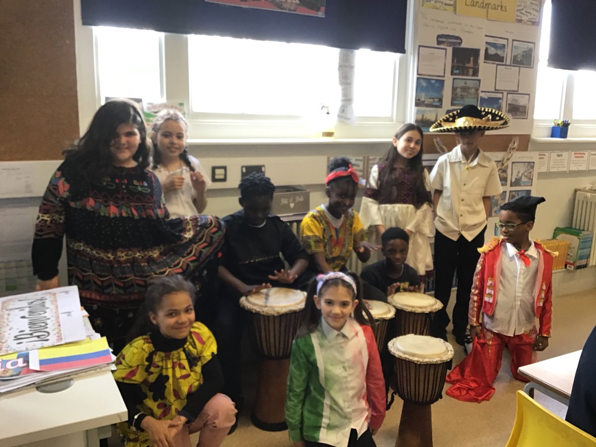 RFitzroyAcademy's tweet photo. An array of cultures and traditional wear were on display for International Week. The children have learned so much about different countries. Now off to the food market we go. Yum yum. #caribclass #internationalweek@rfa #year4 https://t.co/05u4mWMmaA