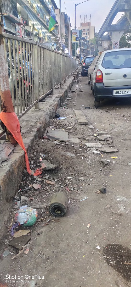 SionFriends's tweet photo. Footpath is damage, Soil is spread over the road due to which biker slip. I request concern authority to do the needful. Location: Near Sanatan Dharma High School Lane, BMC Building C/1. Sardar Nagar No. 4 @mybmcWardFN @mybmcRoads https://t.co/PnciKydDWJ