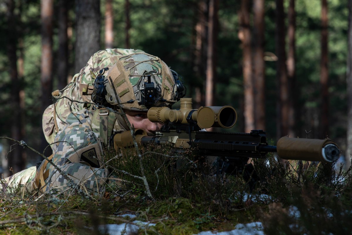 US_SOCEUR's tweet photo. In the forests of Latvia, Latvian National Guard soldiers and U.S. Army #tenthSFG conduct bilateral training to strengthen joint confidence and readiness while promoting stability within the region. #WeAreNato #AlwaysReady @USEmbassyRiga @AizsardzibasMin https://t.co/J3PWc4de5e
