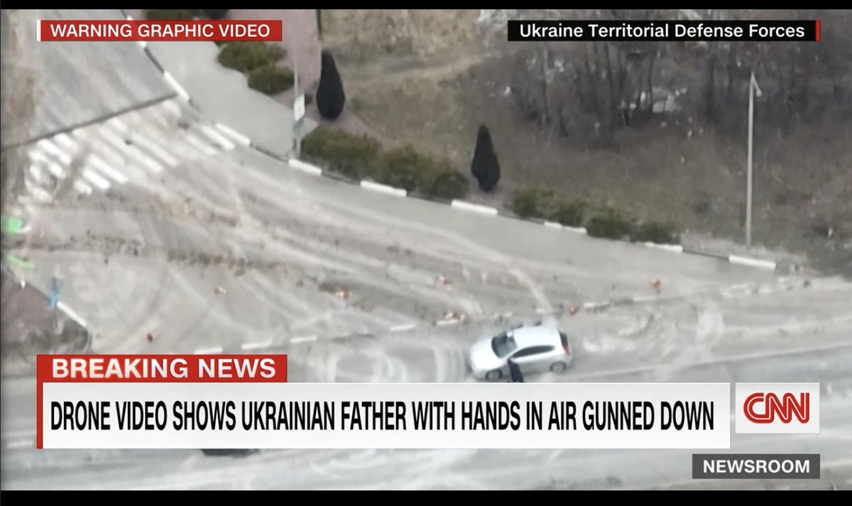 PaulaChertok's tweet photo. 💔❗️Drone video shows Ukrainian father with hands raised being shot by Russian troops. Maksym Iovenko got out of his car and was immediately shot. His wife Ksenia was also shot and killed. Their 6-year-old son was in the car. 😰
#RussianWarCrimesInUkraine https://t.co/B6wLngJPpL