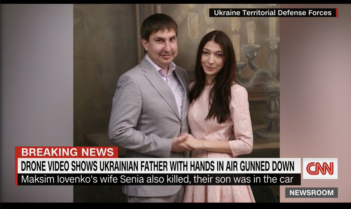 PaulaChertok's tweet photo. 💔❗️Drone video shows Ukrainian father with hands raised being shot by Russian troops. Maksym Iovenko got out of his car and was immediately shot. His wife Ksenia was also shot and killed. Their 6-year-old son was in the car. 😰
#RussianWarCrimesInUkraine https://t.co/B6wLngJPpL