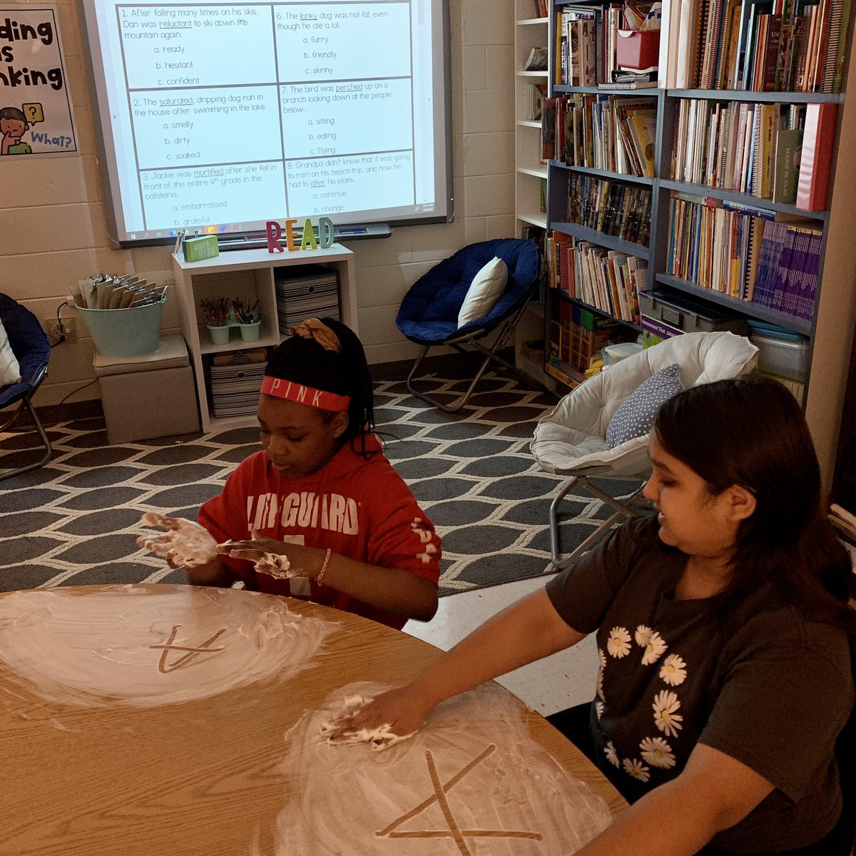 4th Graders using shaving cream to practice using context clues to figure out meanings of words! #ashlandsoar