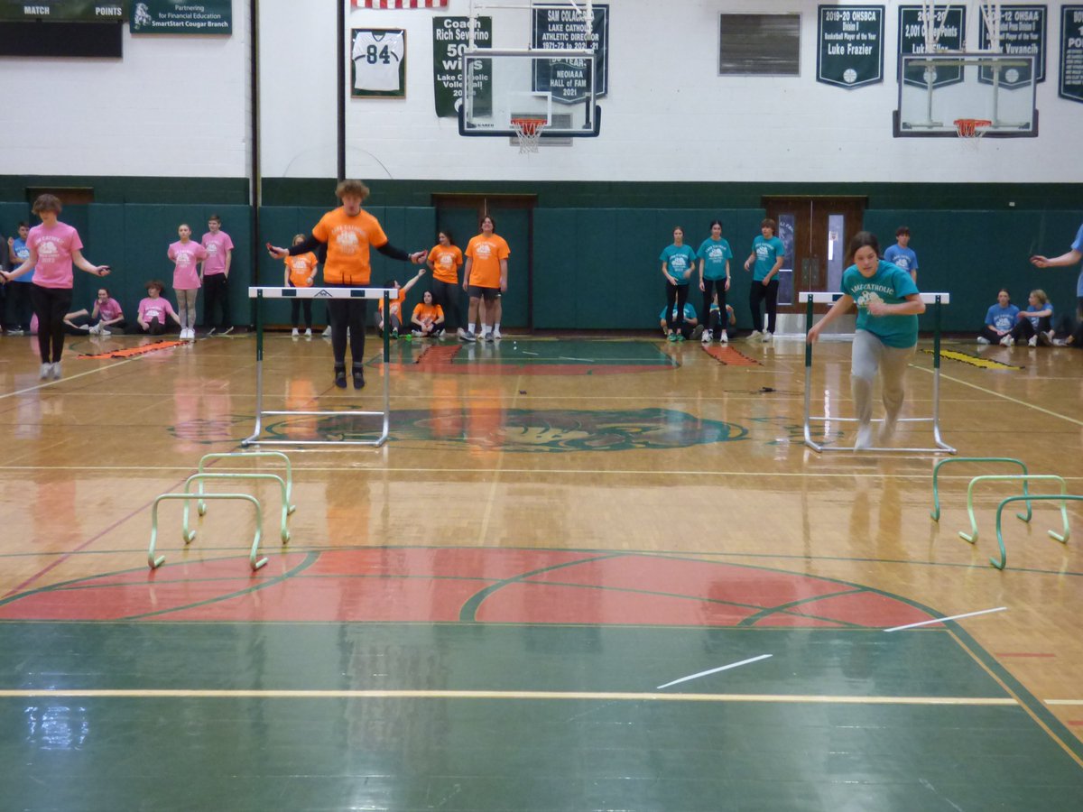 lakecatholic's tweet photo. COUGAR GAMES UPDATE: We have a new leader! On the strength of their win in the obstacle course, the Class of 2022 (seniors) are now on top of the scoreboard. 
Also, the semifinals of the Mario Kart tournament have begun.
#cougargames #onlythreeeventstogo #whosgoingtowin https://t.co/szmEe9UyRh