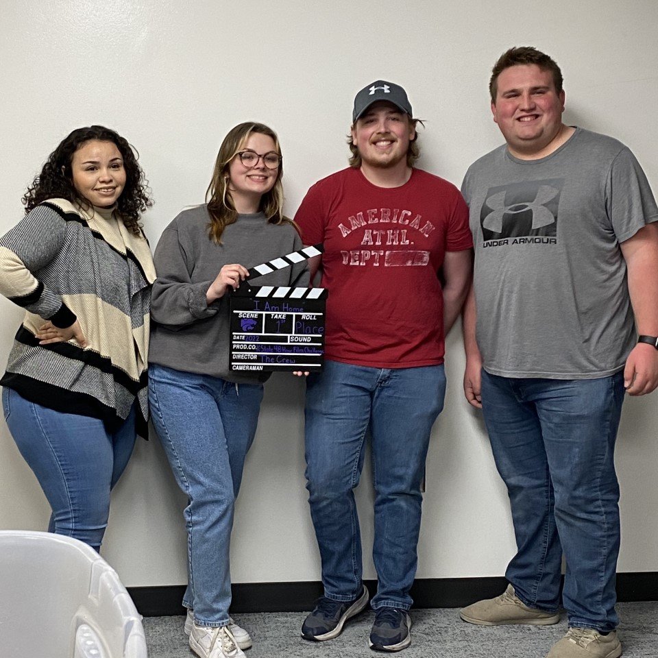 #KState48 2022 winning team, The Crew, receiving a clapper award and $200 for the film "I Am Home." 
From left to right: Jessica Ramirez, Hanna Cavely, Alvin Holmes, Dakota Cherney