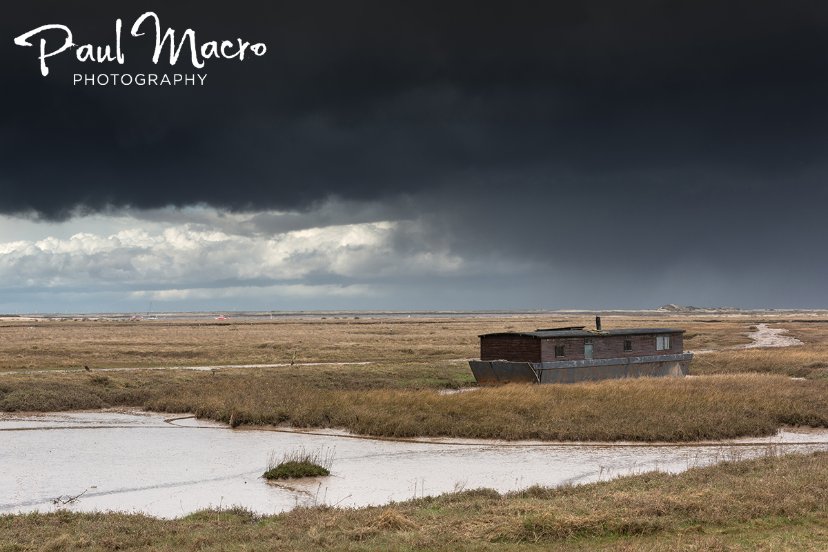 PaulMacro's tweet photo. What a week it's been of #DrRuthGalloway type skies on the #NorthNorfolkCoast Island Cottage, House Boat and some derelict boats @ellygriffiths @QuercusBooks https://t.co/KlC7kCLpNc