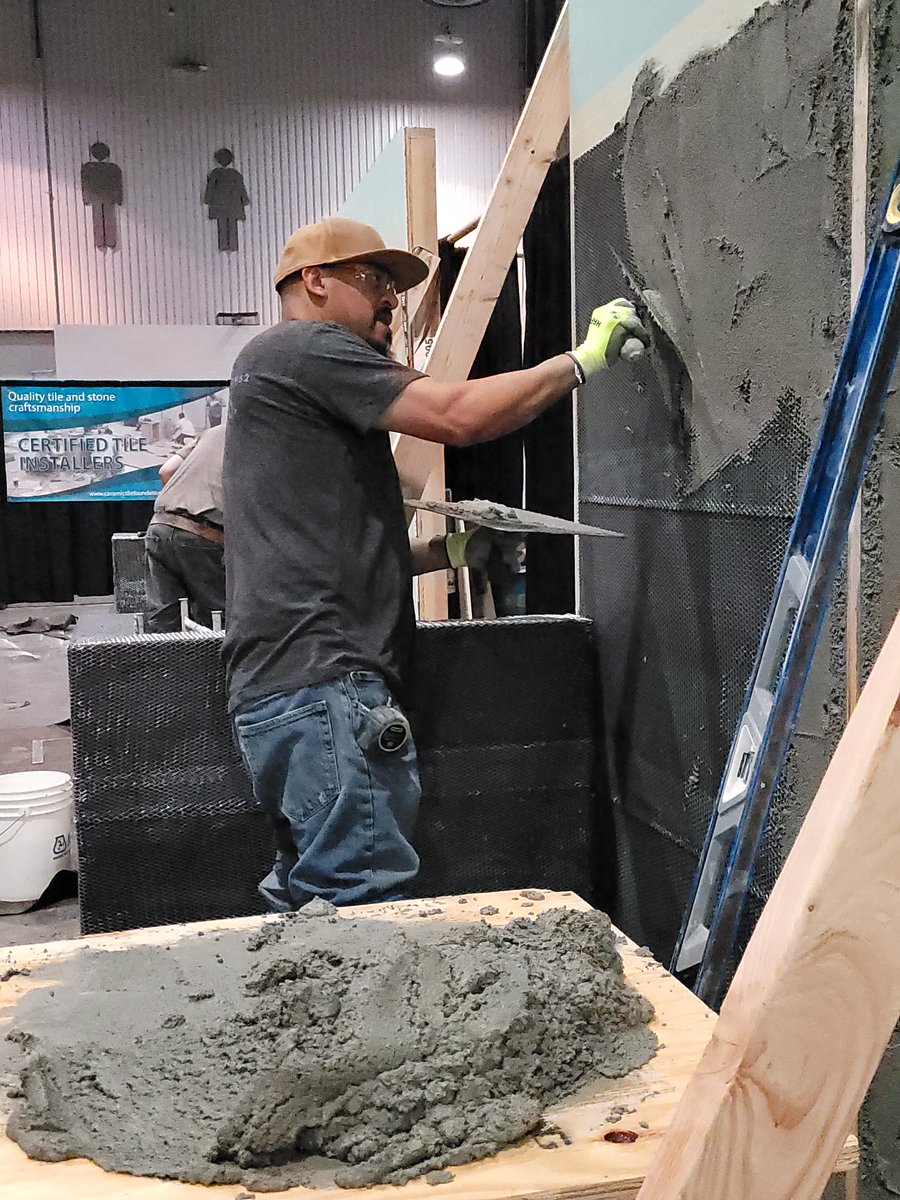 Sika_USA's tweet photo. Installers apply SikaTile-905 Fat Mud at CTEF's "ACT Mud Walls" certification event at Coverings 2022 in Las Vegas. #SikaTile #BuildingTrust #tilesetting https://t.co/LLTsn8kEn8
