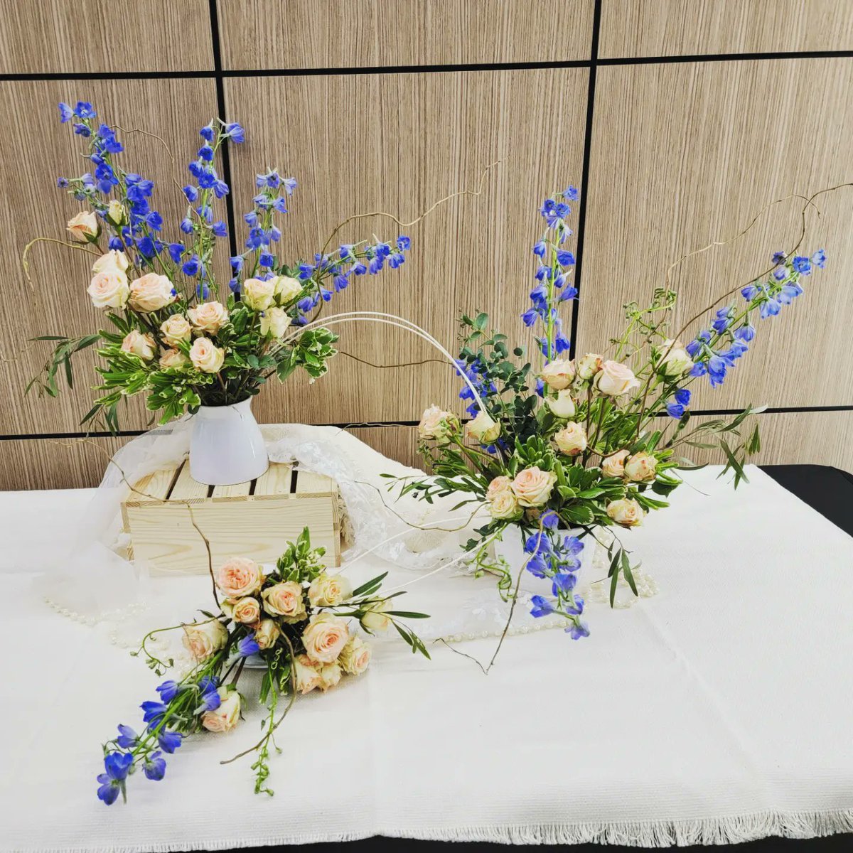 Floral 4 student Kristen created this beautiful synergistic floral design. Notice how she created movement and connected all three arrangements. Gorgeous!!