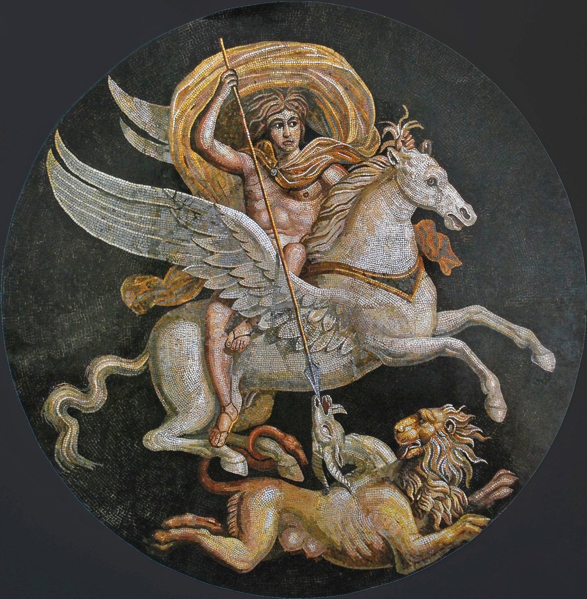 Incredible Roman mosaic showing Bellerophon riding Pegasus and killing the Chimera. The circular emblema mosaic adorned the reception hall of an aristocratic home in Autun (Roman Augustodunum). The composition was later used in the iconography of Saint George slaying the dragon.