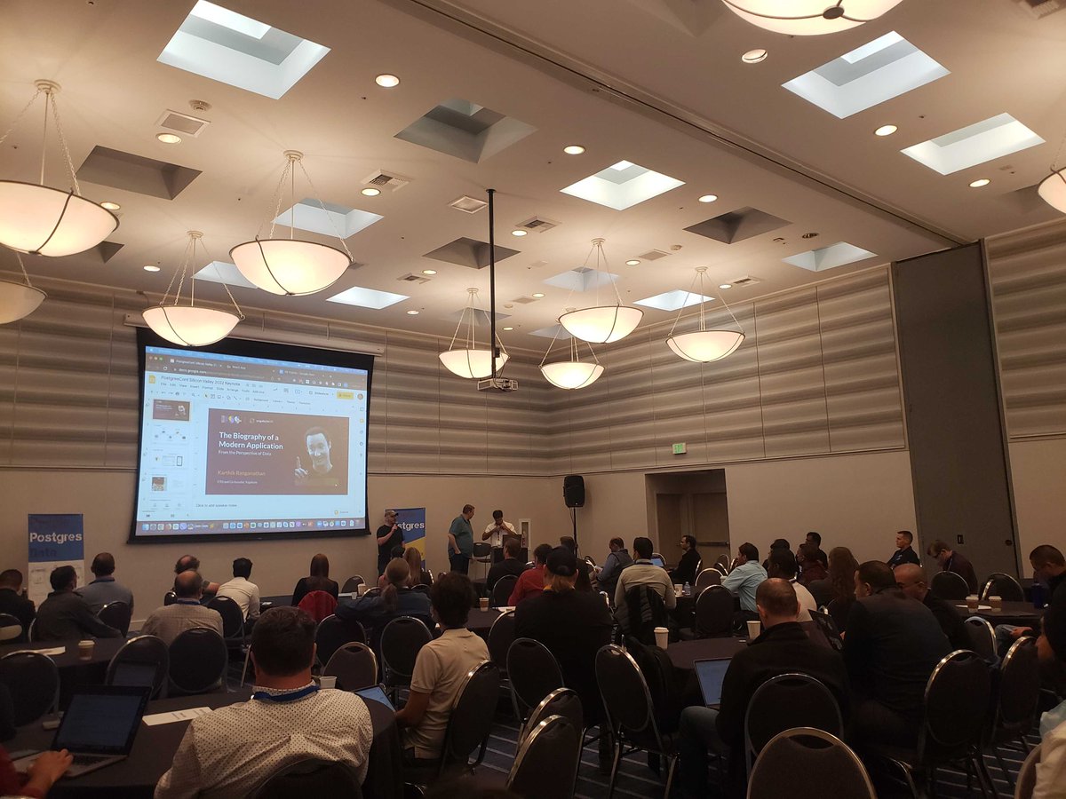 Yugabyte's tweet photo. Great turnout for @karthikr's presentation 'The Biography of a Modern #CloudNative Application,' in the @Yugabyte track at the Silicon Valley @postgresconf earlier. 🚀 

And awesome to catch up with people face-to-face again!

Discover more: https://t.co/QaR7fslgJq https://t.co/uoXLjj9Dl8
