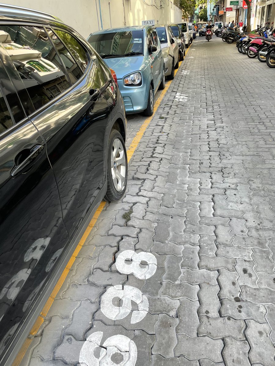HaneefEXP's tweet photo. I don’t know how @MaleCitymv is able to sell public road to pvt individuals like this? Is this legal? @HuShameem the problem is now there’s no space for anyone to park their car. Why can’t  council install metered car parking. That would be fair for all. I wud gleefully pay 4 it https://t.co/tdG1T8FKyg