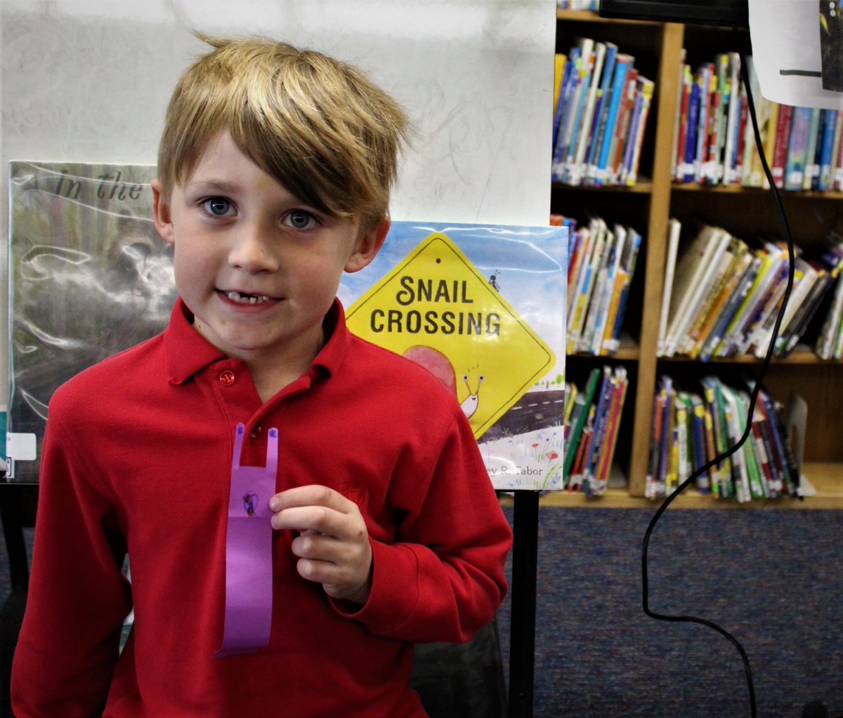 stvincentschool's tweet photo. The Kindergarten class explored the book "Snail Crossing" by Corey R. Tabor in library. It is a story about perseverance and friendship. They also made their own friendly snail creations. #SVLibrary Week https://t.co/LhDPS62Wqt