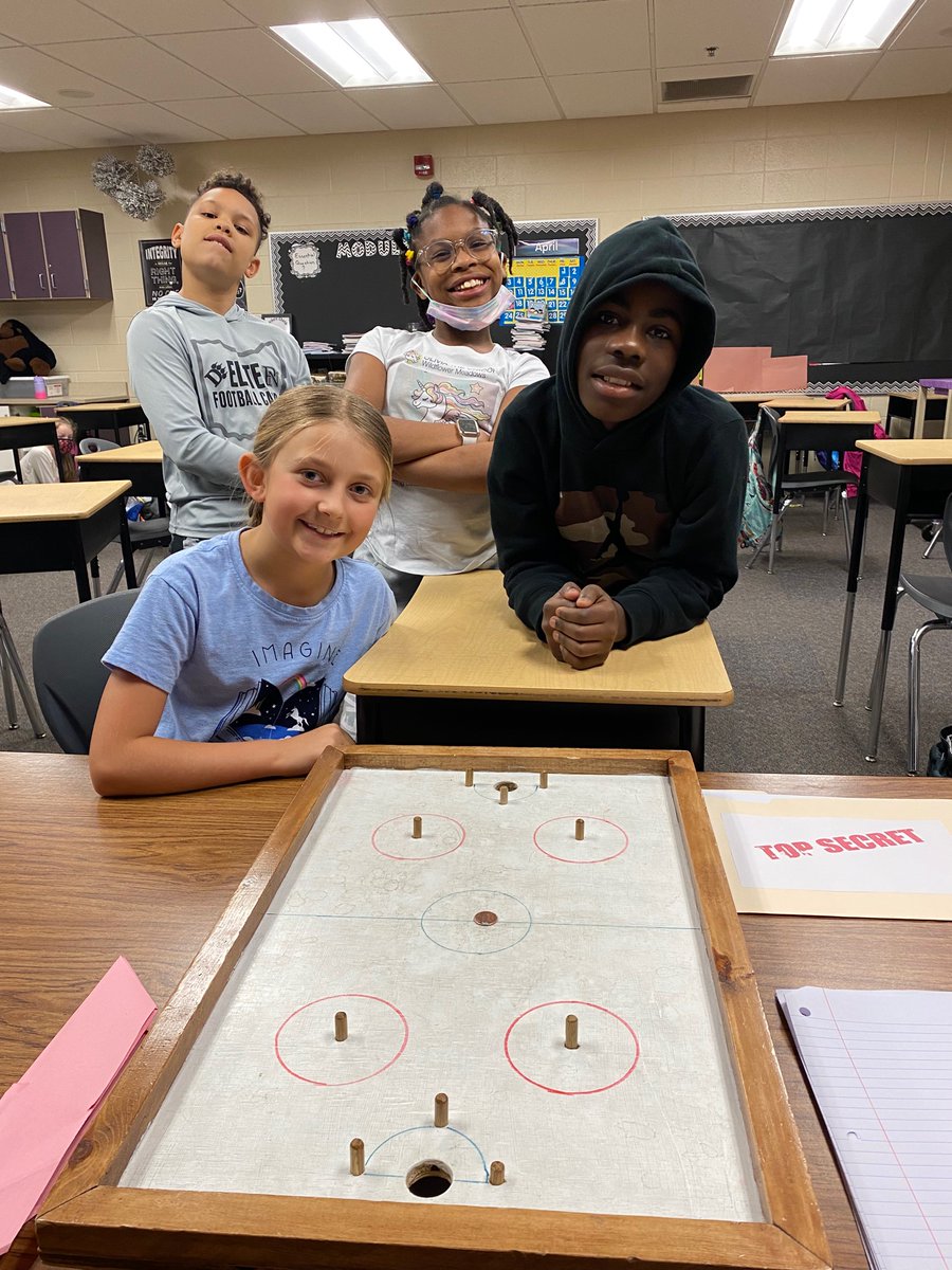 Highlight of my day was learning to play penny hockey with these 4th graders 🥅