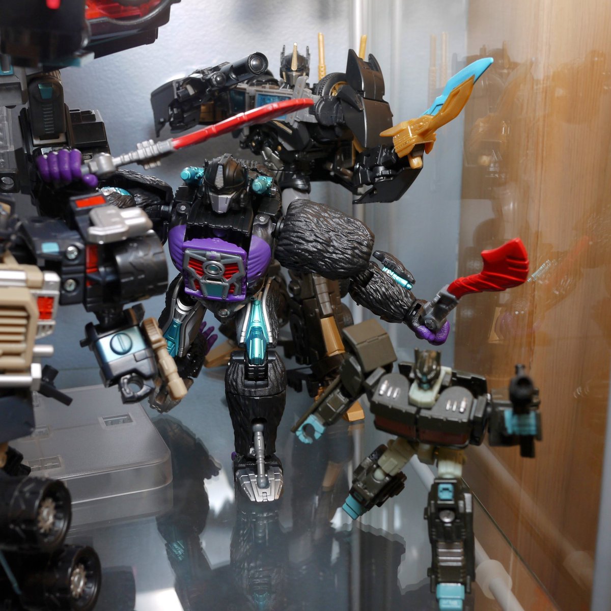 I normally don't do recolored figures, but the  one exception is Nemesis Prime. Given the size of the figures it was a challenge to squeeze in all 8 figures with fairly dynamic poses and I needed to use a dedicated flash with diffuser to properly light all the figures.