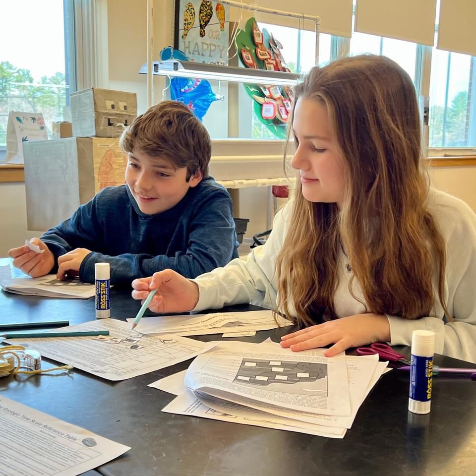 HinghamSchools's tweet photo. 7th-grade students on team Great White Sharks explored Geologic Time Scales as an introduction to their unit on Evolution. So great to see students working collaboratively in groups again! https://t.co/bo7ciOz6KR